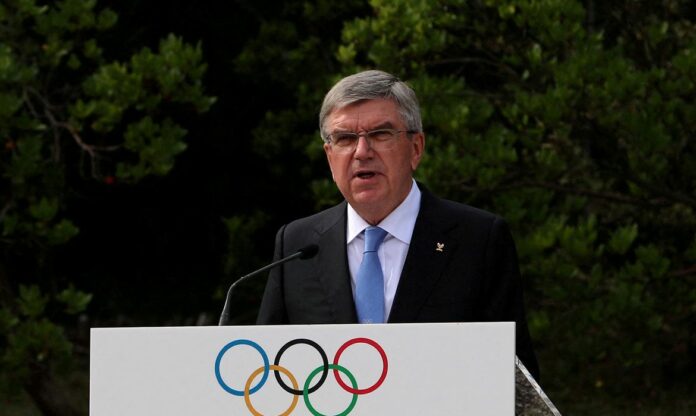 2021-12-15t144219z_1_lynxmpehbe0qj_rtroptp_4_olympics-2022-bach