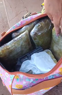Mulher é presa em MS com maconha e arma que seriam levados para RJ