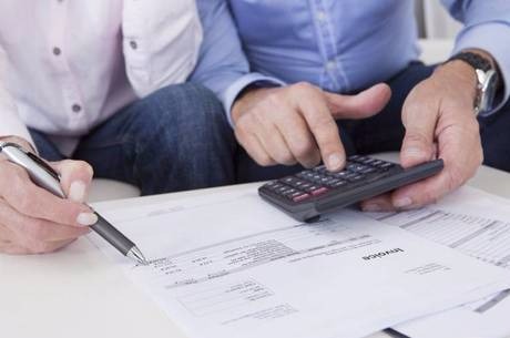 Calote ainda dificulta crédito mesmo após pior momento da crise Volume de crédito concedido subiu 0,4% em julho
Getty Images