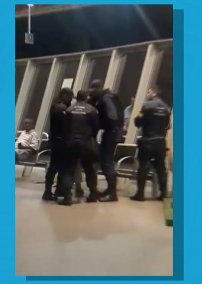 Guardas tentam conter segurança na rodoviária de Campo Grande MS (Foto: Reprodução/ TV Morena)
