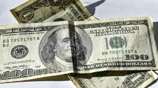 Dólar volta a subir em dia de definição de juros nos EUA