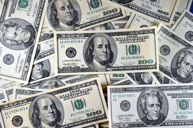 Dólar opera em alta em dia de decisão do Fed e Copom