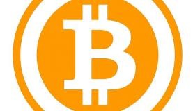 Além do cara ou coroa: bitcoin ultrapassa fronteiras e ganha mais usuários O uso do bitcoin, moeda virtual, vem crescendo em todo o mundo - Bitcoin logo