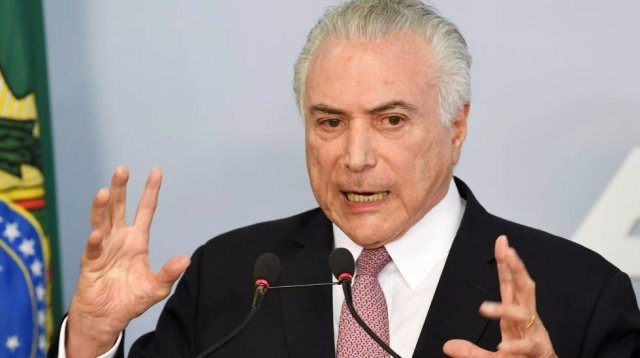 Em evento cheio de pompa política no Planalto, o presidente Michel Temer lança o programa Avançar com previsão de investir R$ 130,9 bilhões (Foto: Agência France Press)