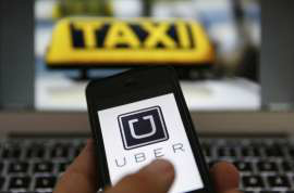 Inimigo dos taxistas, Uber é investigado e pode ser vetado no Brasil KAI PFAFFENBACH O aplicativo Uber em um celular.