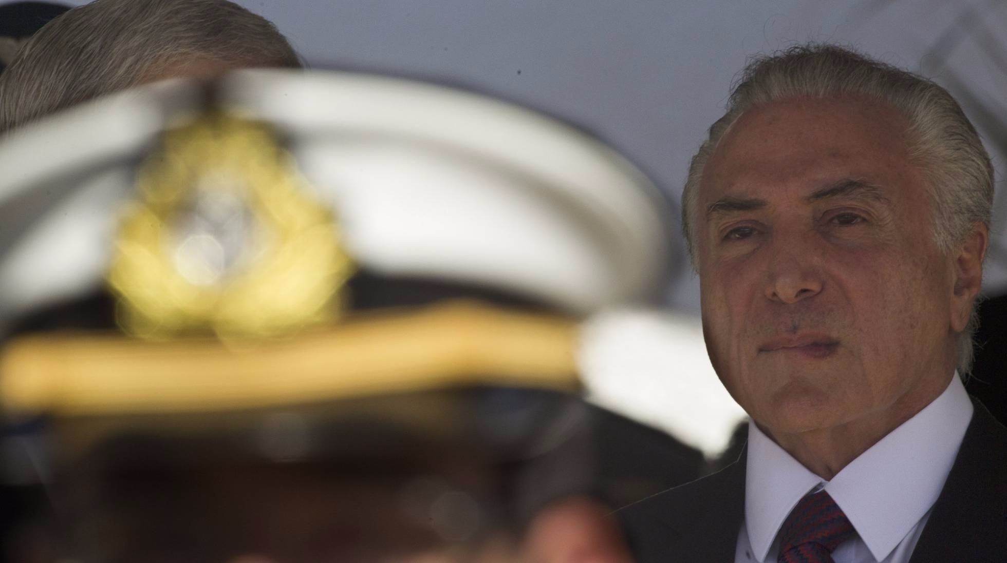 TSE salva Temer, que agora deve enfrentar novo embate na Câmara Michel Temer em cerimônia da Marinha, nesta sexta-feira. JOÉDSON ALVES - EFE