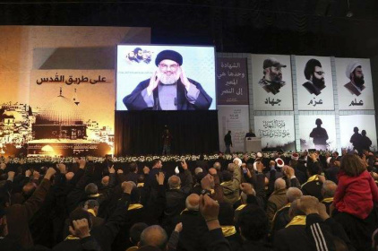 Hezbollah diz que acordo nuclear do Irã "afasta espectro de guerra regional" © REUTERS/Aziz Taher Líder do Hezbollah, Sayyed Hassan Nasrallah, acena a seguidores