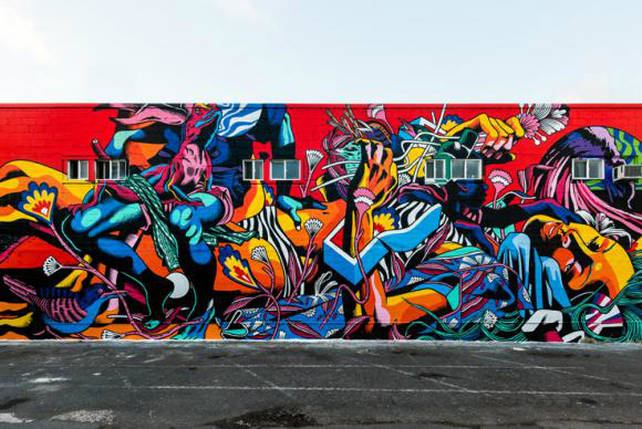 Artistas brasileiros participam de festival de Arte Urbana em Portugal O Painel Pow! How!, pintado no Havaí em 2016, é mostrado no Festival de Arte Urbana em Portugal - Divulgação/Bicicleta sem FreioDivulgação Bicicleta sem Freio