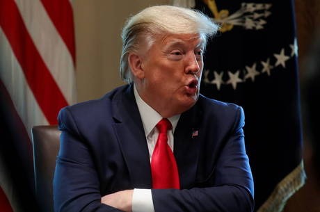 Trump convoca líderes do G7 para videoconferência sobre pandemia Trump convoca reunião do G7 para debater pandemia
Leah Millis/Reuters