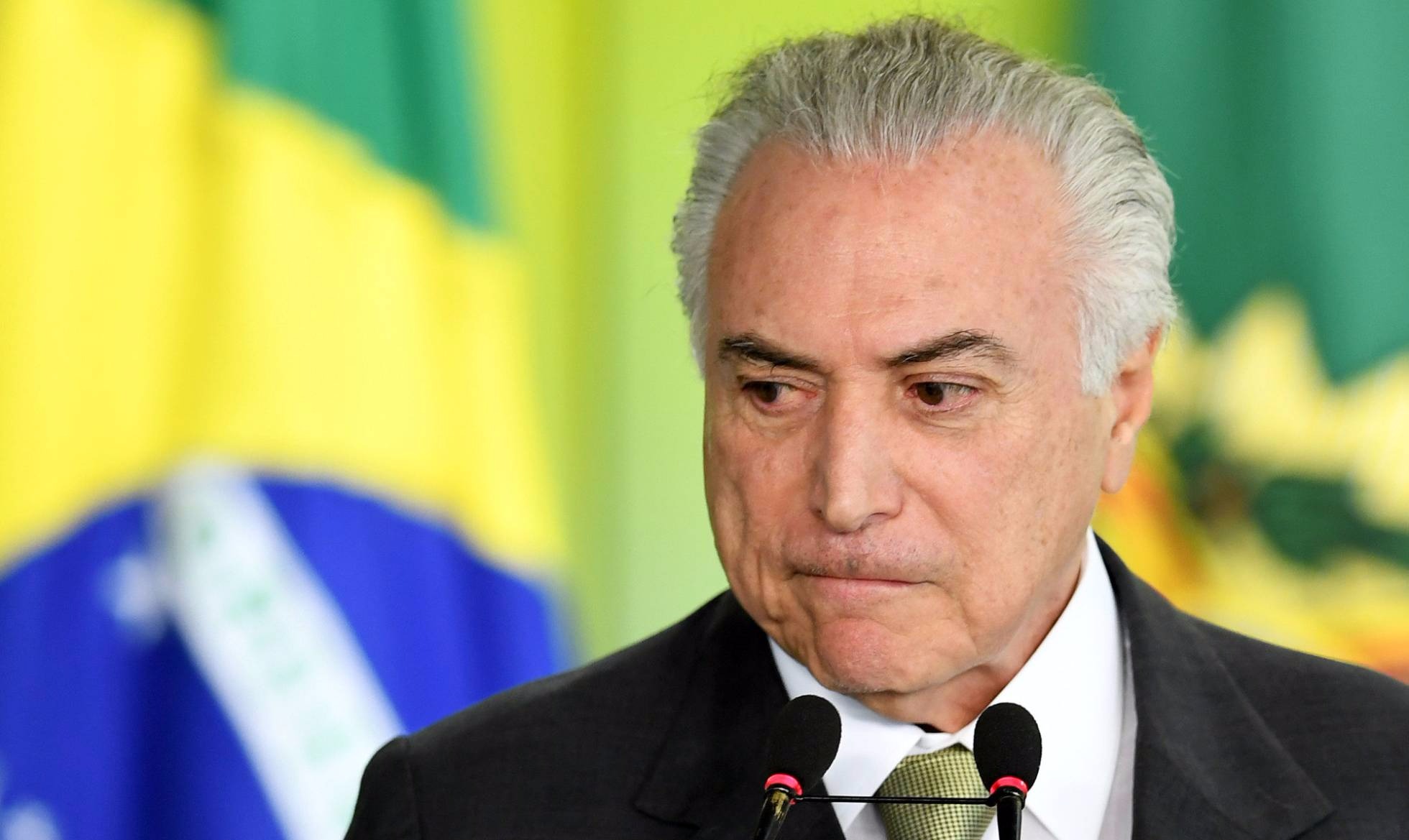 Agonia de Temer alonga a crise no Brasil Presidente Michel Temer em evento no Palácio do Planalto. EVARISTO SA - AFP