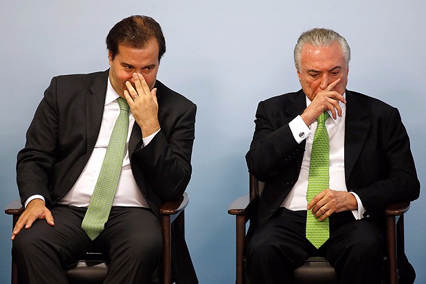 Maia lavou as mãos em relação ao destino de Temer Maia e Temer em evento no mês de junho